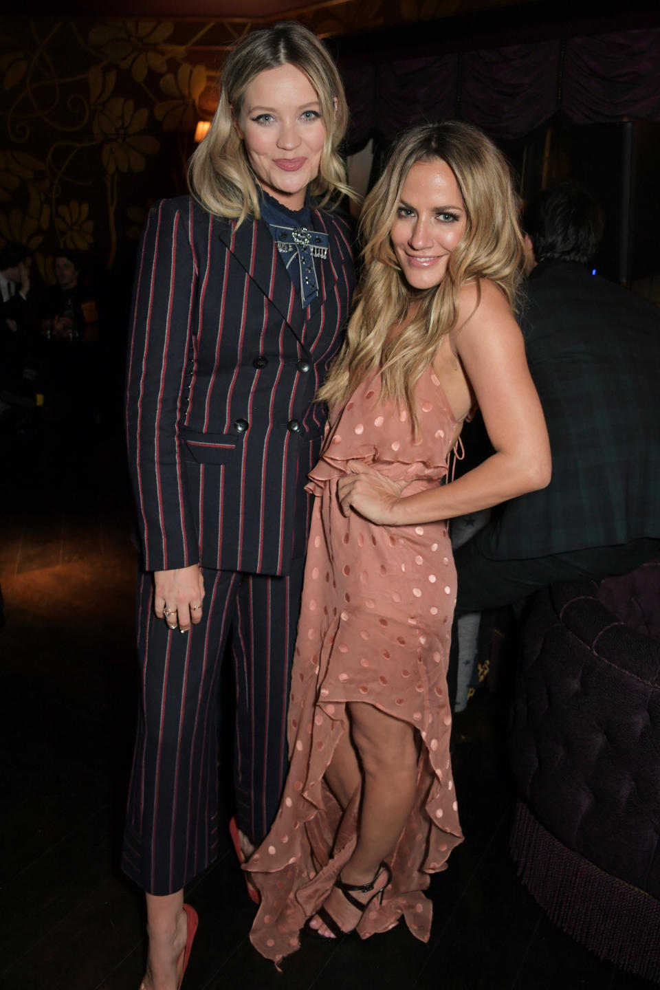 LONDON, ENGLAND - JANUARY 31:   Laura Whitmore and Caroline Flack attend the Vanity Fair EE Rising Star Party ahead of the 2019 EE BAFTAs at The Baptist, L'Oscar Hotel on January 31, 2019 in London, England.  (Photo by David M. Benett/Getty Images for EE)