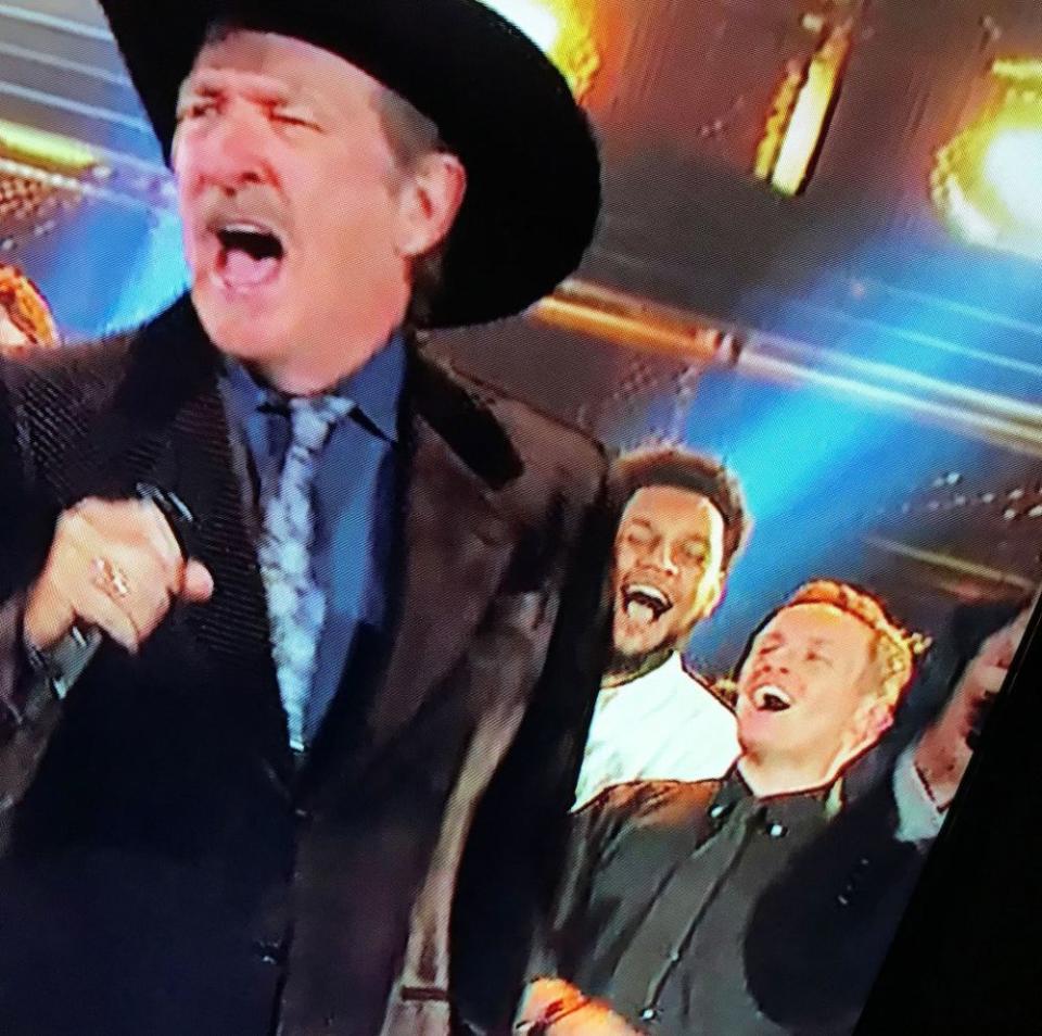 Kix Brooks with Matt Smyth in black tie behind him