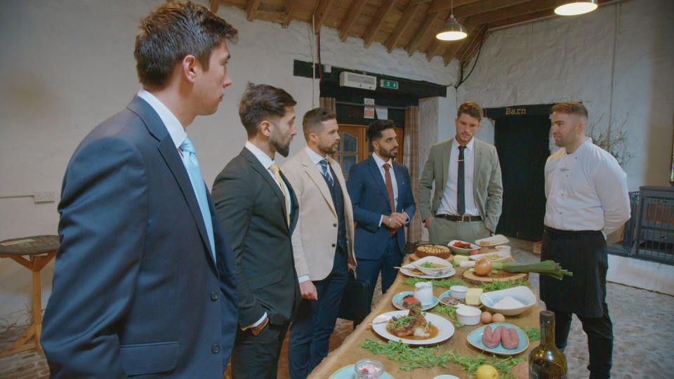 Ollie, Asif, Phil, Paul M, and Jack must negotiate food prices for a task. (BBC)