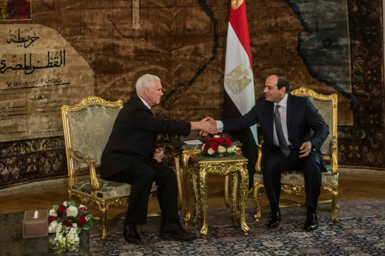 Egyptian President Abdel Fattah al-Sisi (R) welcomes US Vice President Mike Pence at the Presidential Palace in Cairo on January 20, 2018