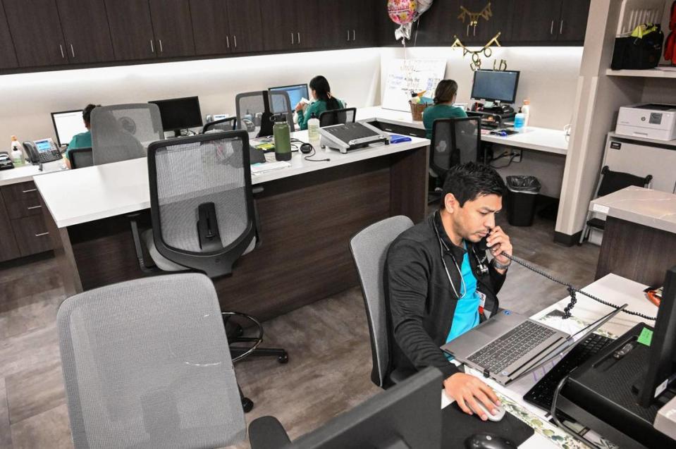 Medical staff work in a collaborative work station at Camarena Health Clinic in Madera on Monday, July 24, 2023 where the clinic has expanded services for patients to alleviate health issues due to the closure of Madera Community Hospital.