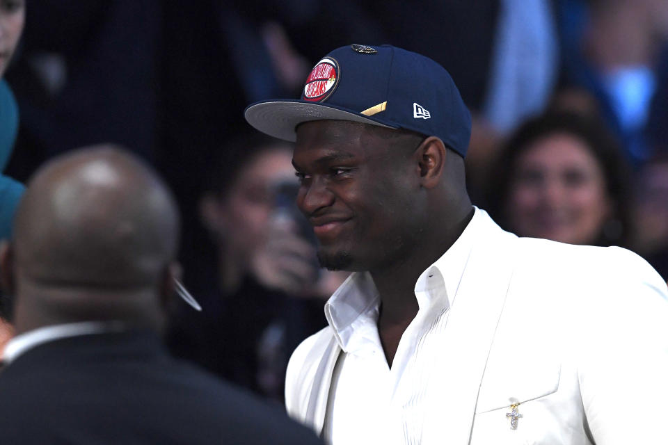 NEW YORK, NEW YORK - JUNE 20: Zion Williamson reacts after being drafted with the first overall pick by the New Orleans Pelicans during the 2019 NBA Draft at the Barclays Center on June 20, 2019 in the Brooklyn borough of New York City. NOTE TO USER: User expressly acknowledges and agrees that, by downloading and or using this photograph, User is consenting to the terms and conditions of the Getty Images License Agreement. (Photo by Sarah Stier/Getty Images)