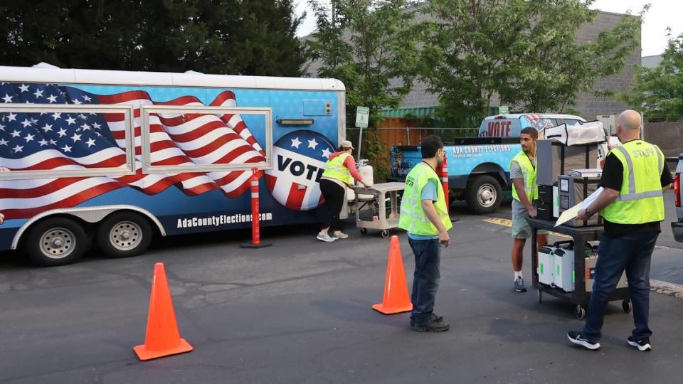 Ada County poll workers collect voting machines, paper ballots and other election supplies from each of the county’s 197 precincts after the primary election May 21.