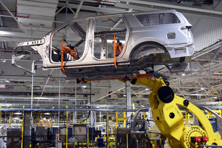 A large robot nicknamed 'Kong' lifts the body of a Ford Expedition SUV at Ford's Kentucky Truck Plant as the No. 2 U.S. automaker ramps up production of two large SUV models in Louisville, Kentucky, U.S., February 9, 2018. REUTERS/Nick Carey