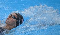 <p>USA's Hali Flickinger competes in the final of the women's 400m individual medley swimming event during the Tokyo 2020 Olympic Games at the Tokyo Aquatics Centre in Tokyo on July 25, 2021. (Photo by Oli SCARFF / AFP)</p> 