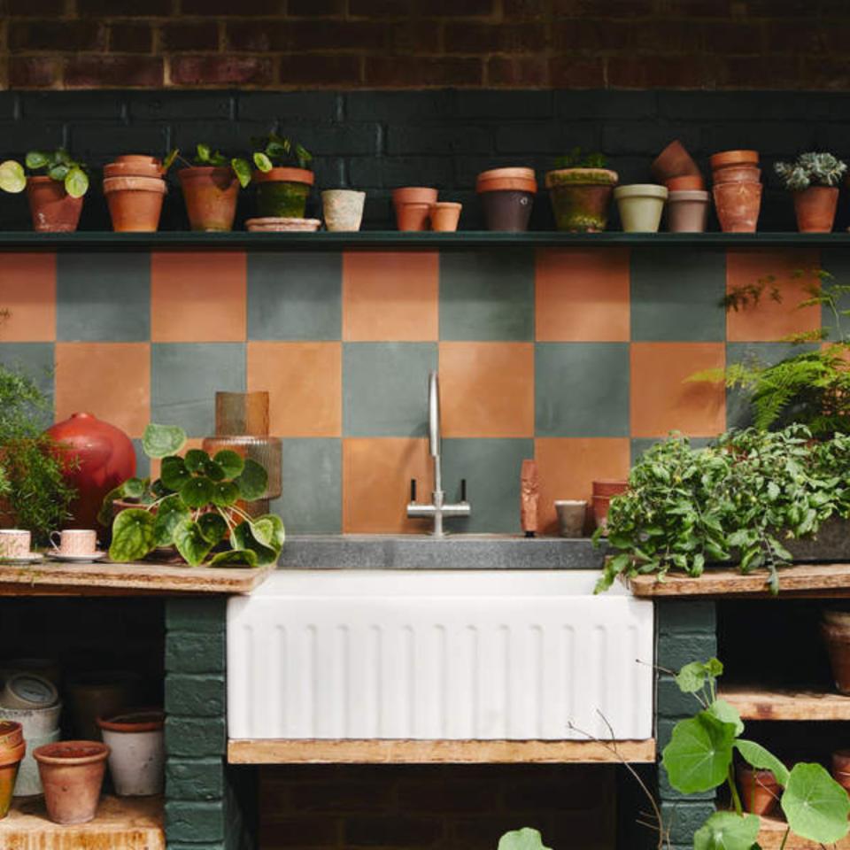 Indoor herb garden with a butler's sink