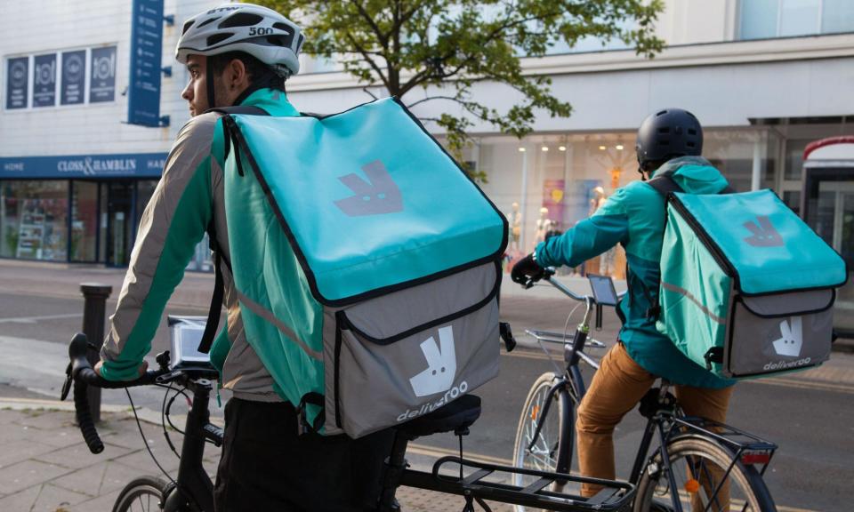 <span>Deliveroo couriers in Brighton, East Sussex remain in high demand, according to IFS research.</span><span>Photograph: BMD Images/Alamy</span>