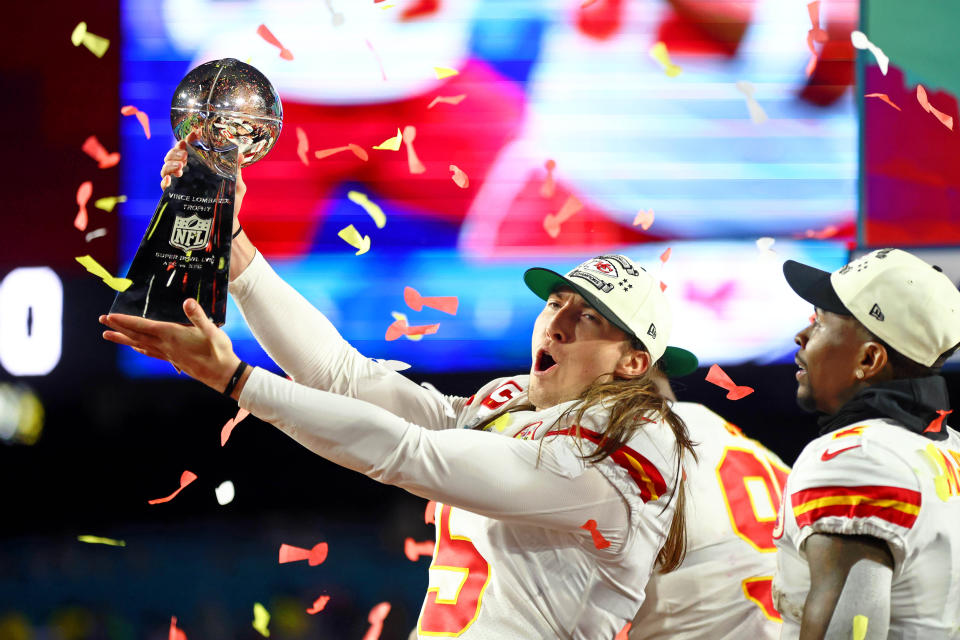 Feb 12, 2023; Glendale, Arizona, US; Kansas City Chiefs punter Tommy Townsend (5) holds the Vince Lombardi Trophy after winning Super Bowl LVII against the Philadelphia Eagles at State Farm Stadium. Mandatory Credit: Mark J. Rebilas-USA TODAY Sports