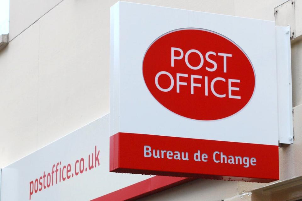 Closures of local bank branches across the UK have increased demand for cash deposit services at Post Offices, according to research (PA) (PA Archive)