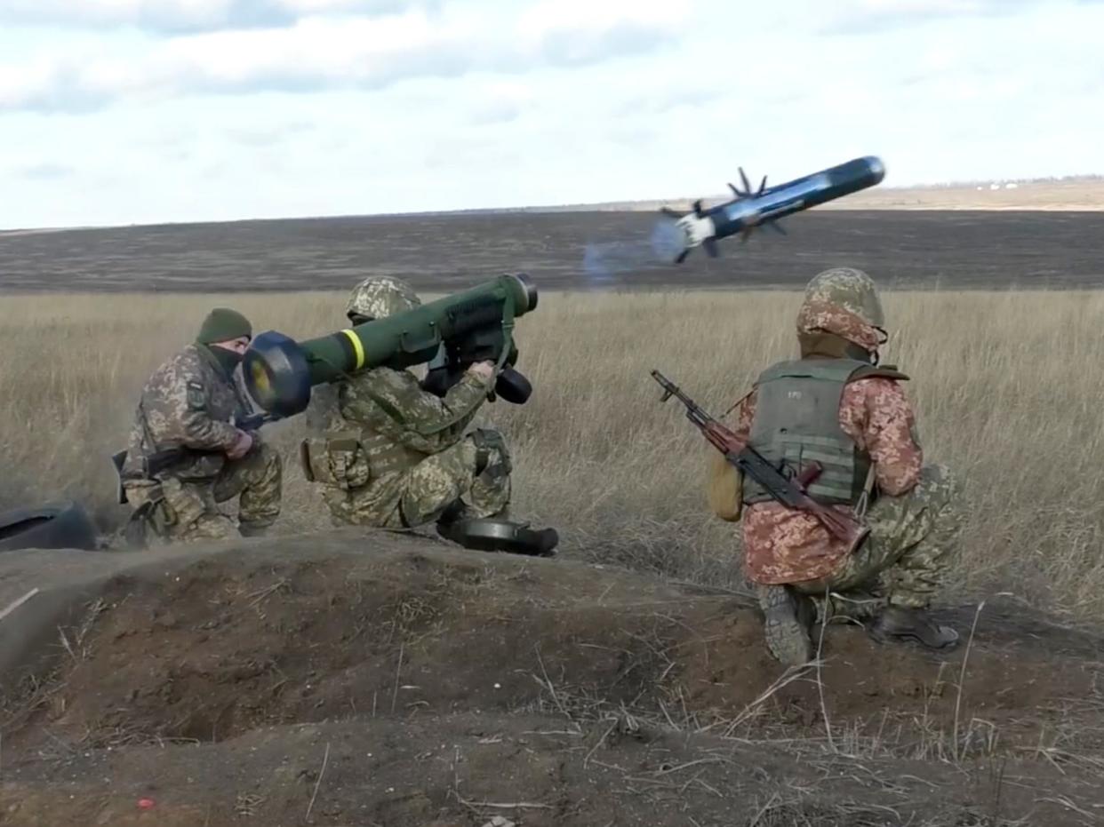 In this image taken from footage provided by the Ukrainian Defense Ministry Press Service, a Ukrainian soldiers use a launcher with US Javelin missiles during military exercises in Donetsk region, Ukraine, Wednesday, Jan. 12, 2022.