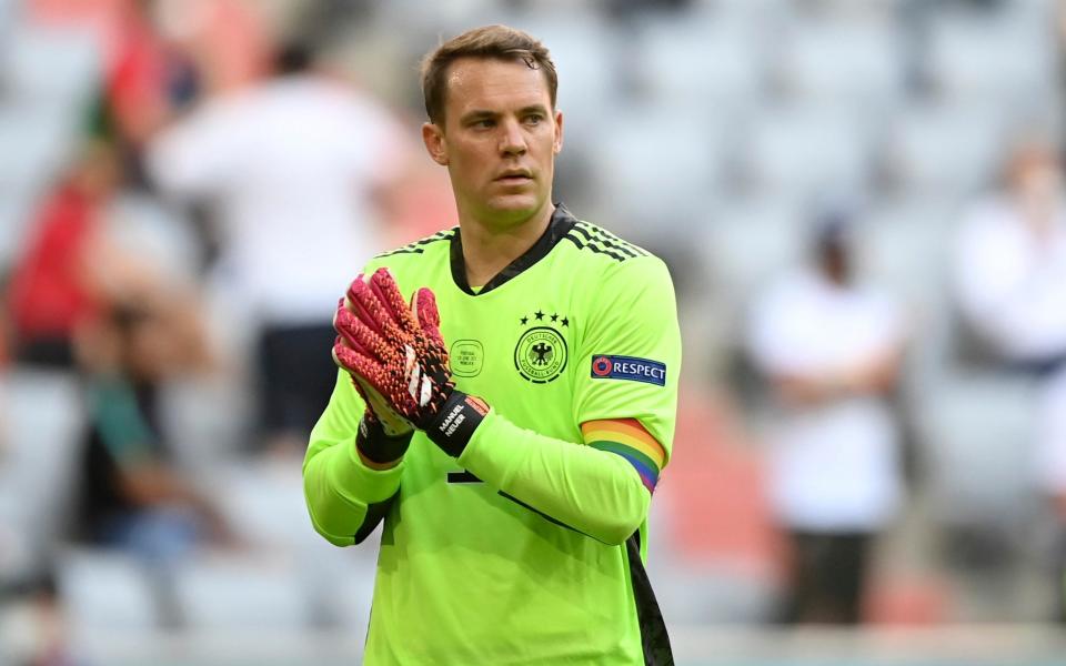  Germany's goalkeeper Manuel Neuer walks on the pitch during the Euro 2020 soccer championship group F match between Portugal and Germany at the Football Arena stadium in Munich, Germany, Saturday, June 19, 2021 - Philipp Guelland/Pool via AP