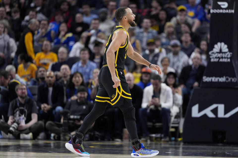 Golden State Warriors guard Stephen Curry limps off the court during the second half of the team's NBA basketball game against the Chicago Bulls, Thursday, March 7, 2024, in San Francisco. (AP Photo/Godofredo A. Vásquez)