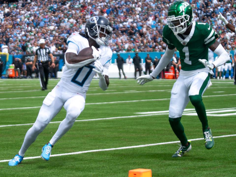 Tennessee Titans wide receiver Calvin Ridley (0) heads for the end zone pylon as New York Jets cornerback Sauce Gardner (1) tries to close during their game at Nissan Stadium in Nashville, Tenn., Sunday, Sept. 15, 2024.