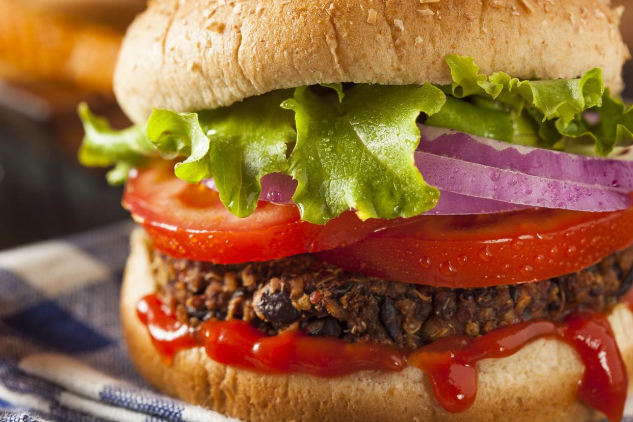 Homemade Healthy Vegetarian Quinoa Burger with Lettuce and Tomato