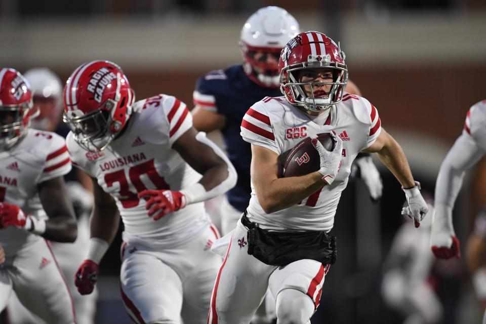 Usual UL holder Dalen Cambre ran 26 yards with a mishandled punt snap for a scoop-and-score Ragin' Cajuns  touchdown Saturday at Liberty.