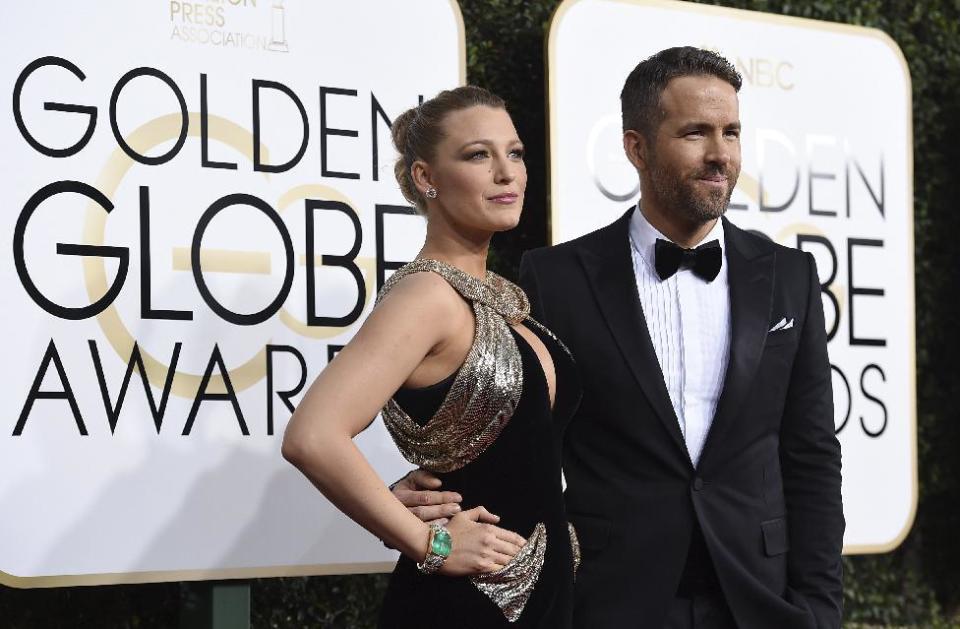 Blake Lively, left, and Ryan Reynolds arrive at the 74th annual Golden Globe Awards at the Beverly Hilton Hotel on Sunday, Jan. 8, 2017, in Beverly Hills, Calif. (Photo by Jordan Strauss/Invision/AP)