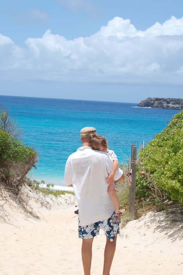 The author's husband and son relax on another beautiful day in the Caribbean.