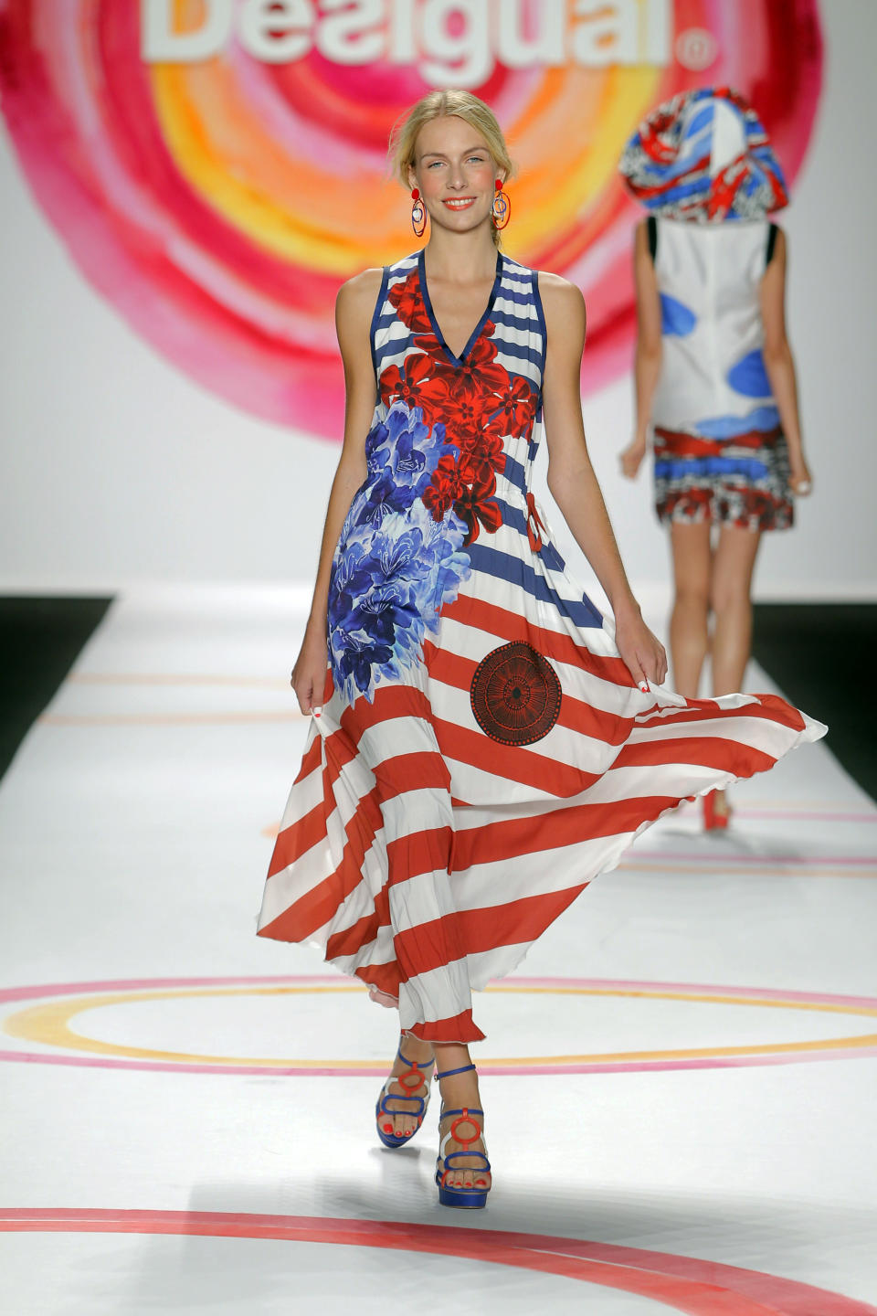 In this Thursday, Sept. 6, 2013, photo, fashion from the Desigual Spring 2014 collection is modeled during Fashion Week in New York. (AP Photo/Desigual)