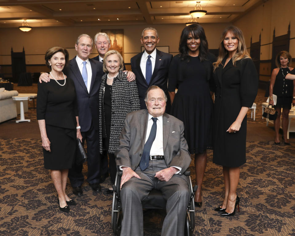 This photo provided by the office of former President George H.W. Bush shows Bush, center, with past presidents and first ladies at the funeral service for former first lady Barbara Bush in Houston on April 21, 2018.. From left: Laura Bush, former President George W. Bush, former President Bill Clinton, Hillary Clinton, former President Barack Obama, Michelle Obama and first lady Melania Trump. (Photo: Paul Morse/Courtesy of Office of George H.W. Bush via AP)