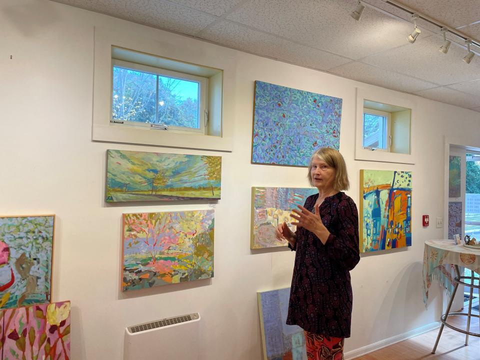 Art Up Front Street owner Rose Bryant showcases her current work in her studio in Exeter.