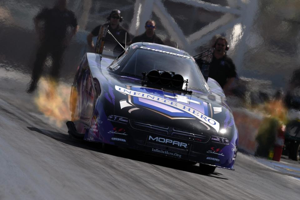 Don Schumacher Racing driver Jack Beckman launches his Dodge Charger Funny Car during an NHRA testing session on April 9, 2018 at The Strip at Las Vegas Motor Speedway.