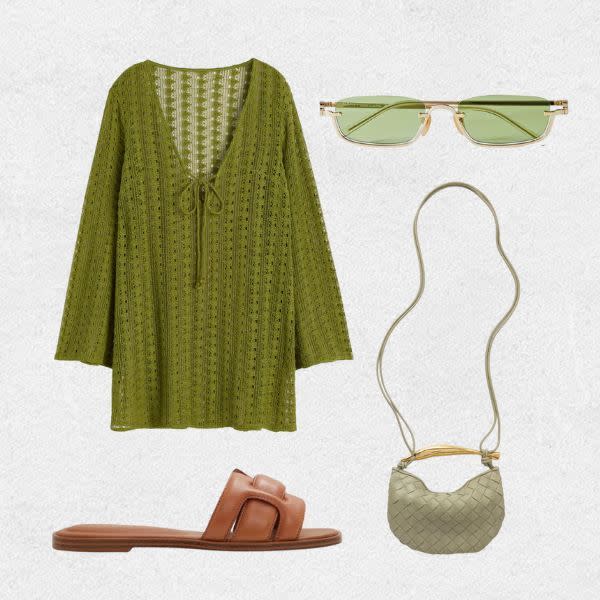 Green kaftan styled with tinted shades, shoulder bag and tan flat sandals 