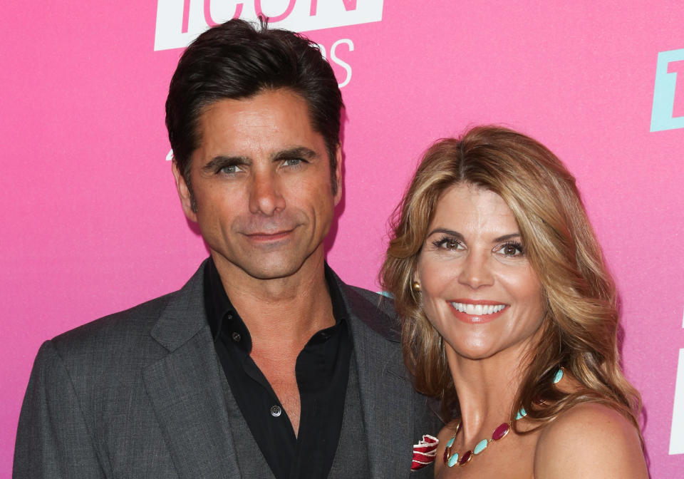 SANTA MONICA, CALIFORNIA - APRIL 10:  Actors John Stamos (L) and Lori Loughlin (R) attend the TV Land Icon Awards at The Barker Hanger on April 10, 2016 in Santa Monica, California.  (Photo by Paul Archuleta/FilmMagic)