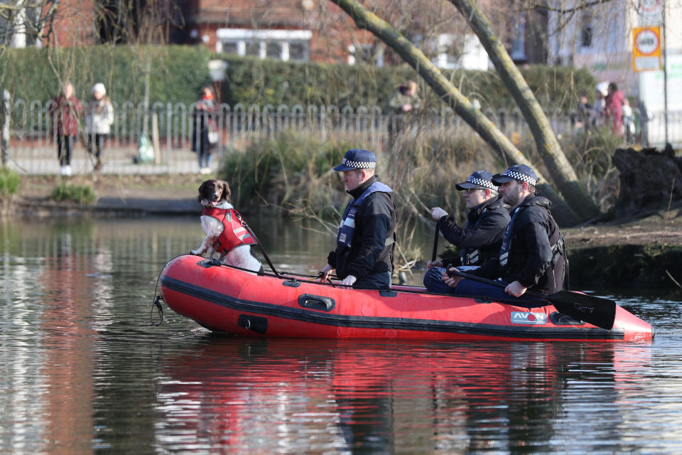 Police in a RIB with a sniffer dog search Eagle Pond on Clapham Common for missing woman Sarah Everard, 33, who left a friend's house in Clapham, south London, on Wednesday evening at around 9pm and began walking home to Brixton. Picture date: Sunday March 7, 2021.