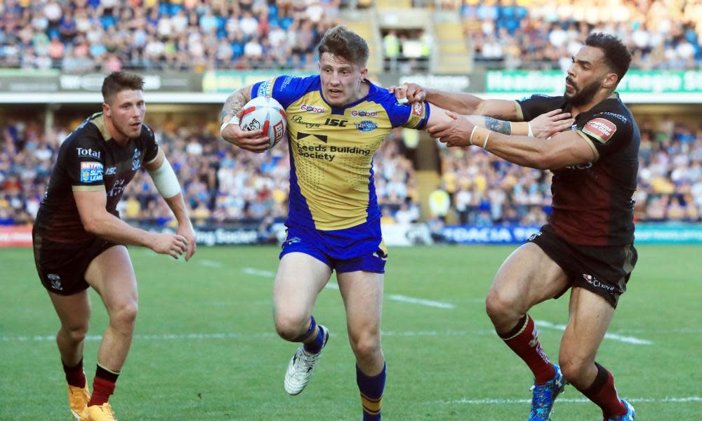 Liam Sutcliffe breaks through to score Leeds’ second try against Warrington at Headingley.
