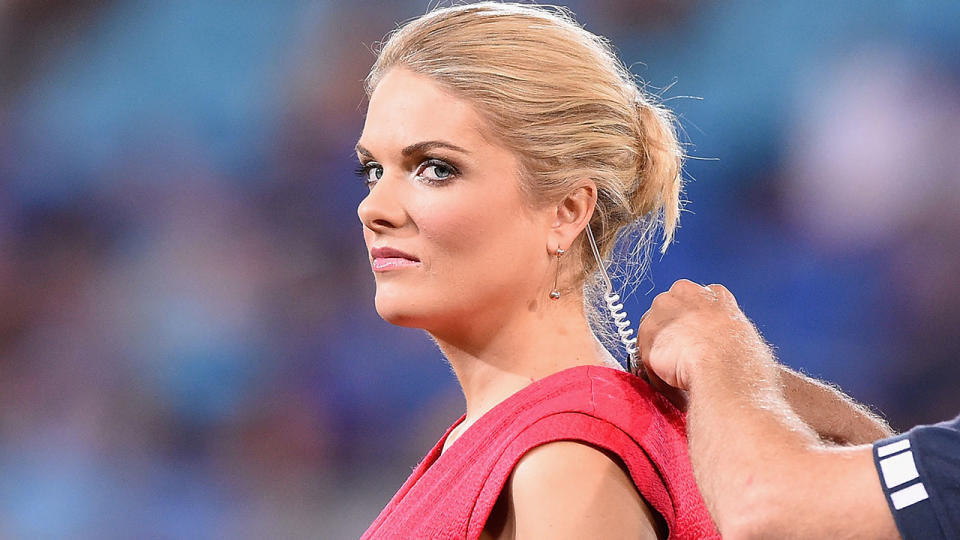 Seen here, Erin Molan getting mic'd up for her rugby league presenting duties.