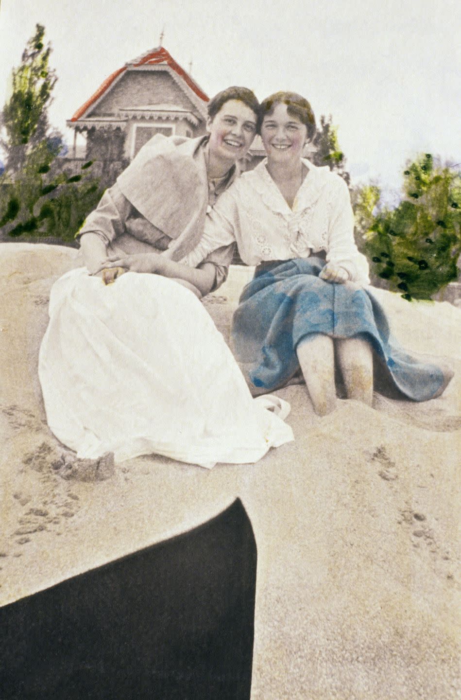 <p>Olga and one of her friends on the dunes in Crimea. The photo was believed to have been colored by one of the Romanov sisters.</p>