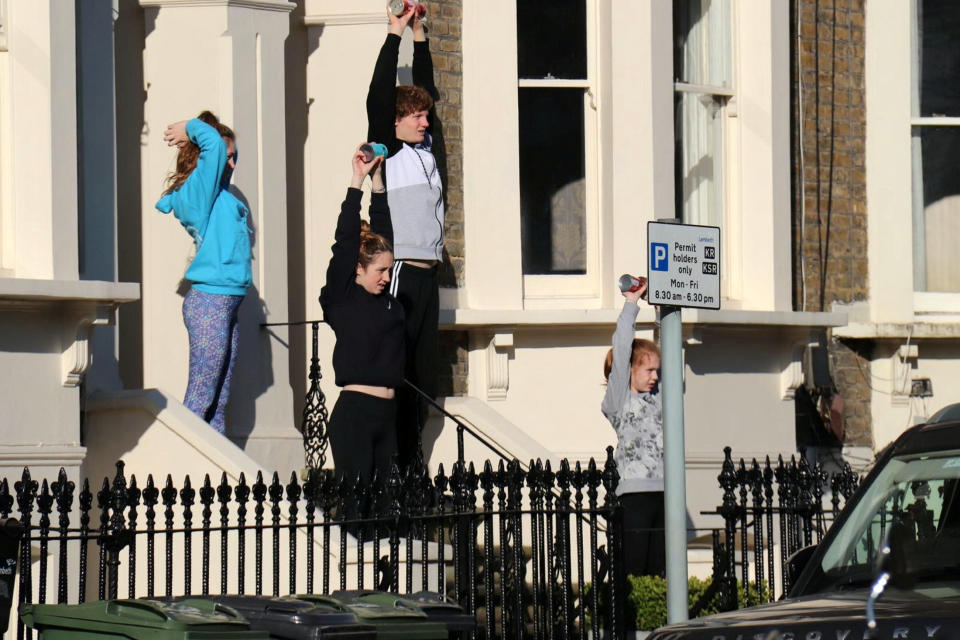 This family got involved in the step workout. (SWNS)