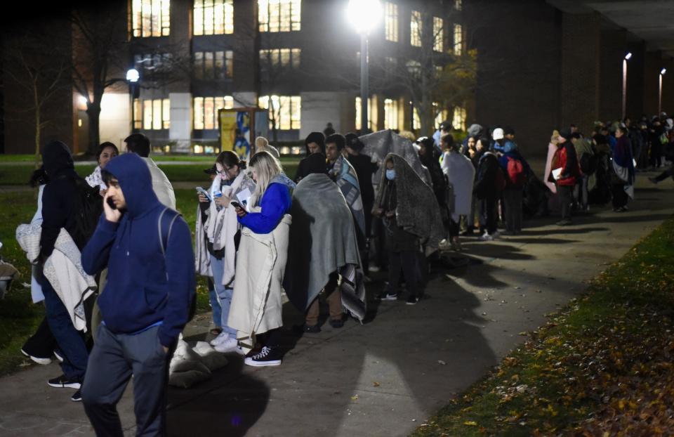 Hundreds of University of Michigan students waited in line for hours to register to vote at the Ann Arbor city clerk's satellite office at the university's Museum of Art on Tuesday, Nov. 8, 2022. (Ryan Stanton/Ann Arbor News via AP)