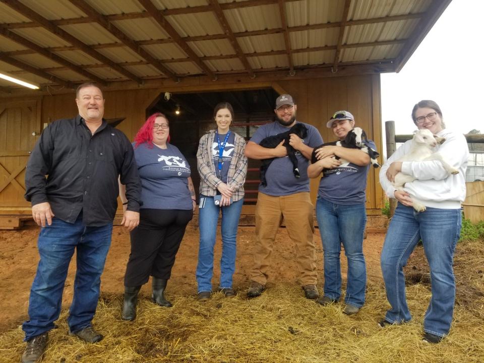 Courtney Happ with the second-year degree students at NC Kikos, a farm owned by Clint Walker and Deb Brentlinger which sells purebred Kikos goats.