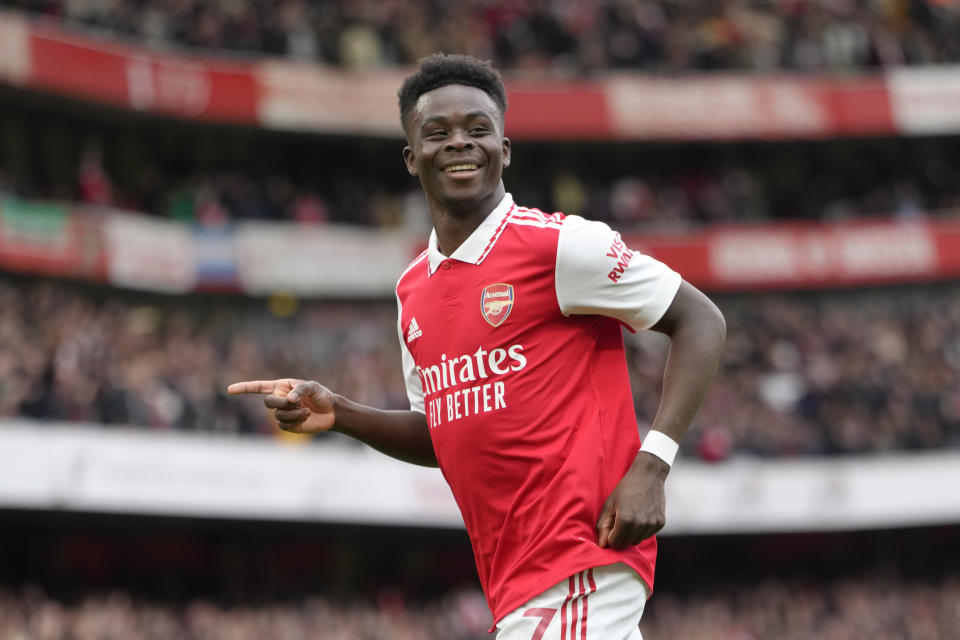 Arsenal's Bukayo Saka celebrates after scoring his side's second goal during the English Premier League soccer match between Arsenal and Crystal Palace at Emirates stadium in London, Sunday, March 19, 2023. (AP Photo/Kirsty Wigglesworth)