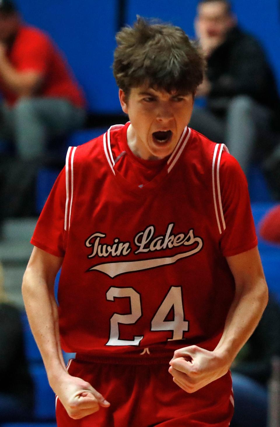 Twin Lakes guard Jamison Ousley (24) celebrates after scoring during the IHSAA boys basketball sectional game against the Western, Friday, March 3, 2023, at Case Arena in Frankfort, Ind. Twin Lakes won 45-43. Ousley signed to play golf at Evansville.