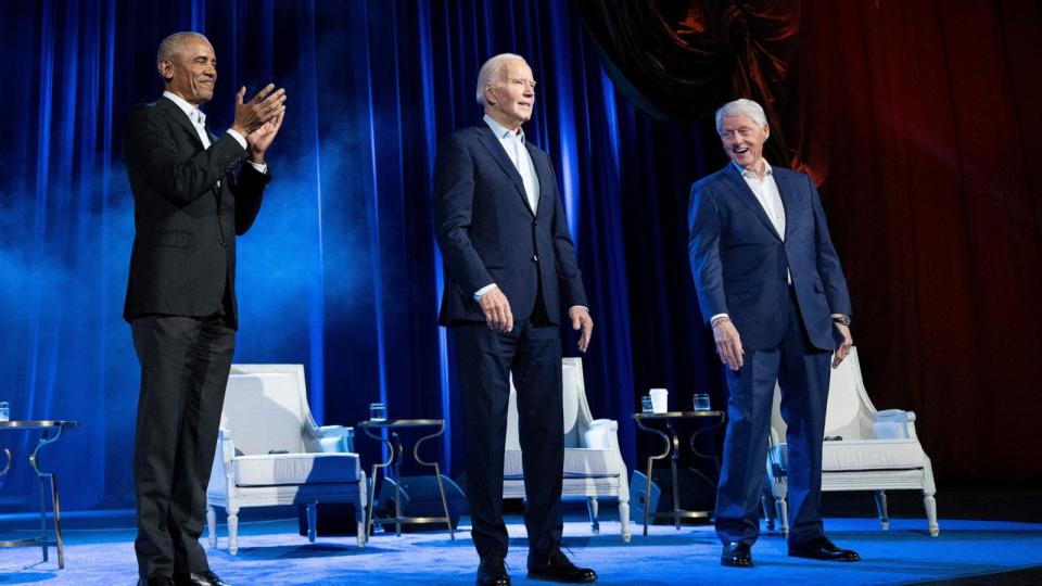 PHOTO: Former President Barack Obama (L) and former US President Bill Clinton (R) cheer for US President Joe Biden during a campaign fundraising event at Radio City Music Hall in New York City on March 28, 2024. (Brendan Smialowski/AFP via Getty Images)