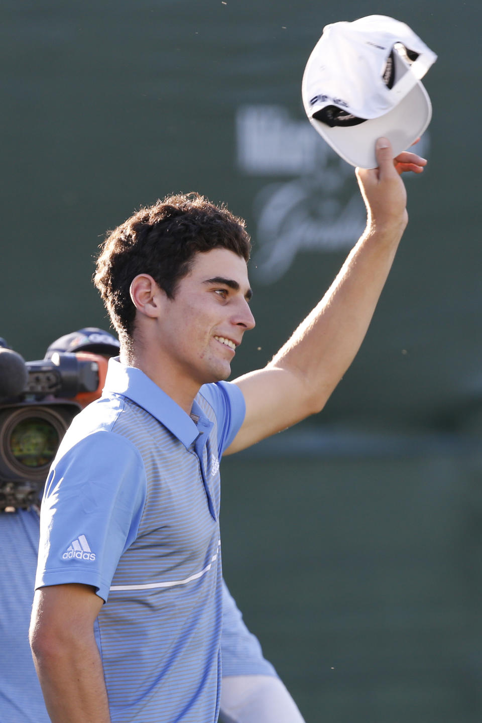 Joaquin Niemann, of Chile, celebrates a birdie putt on the last 18th hole to win the A Military Tribute at The Greenbrier golf tournament in White Sulphur Springs, W.Va., Sunday, Sept. 15, 2019. Niemann finished the tournament at 21-under-par. (AP Photo/Steve Helber)