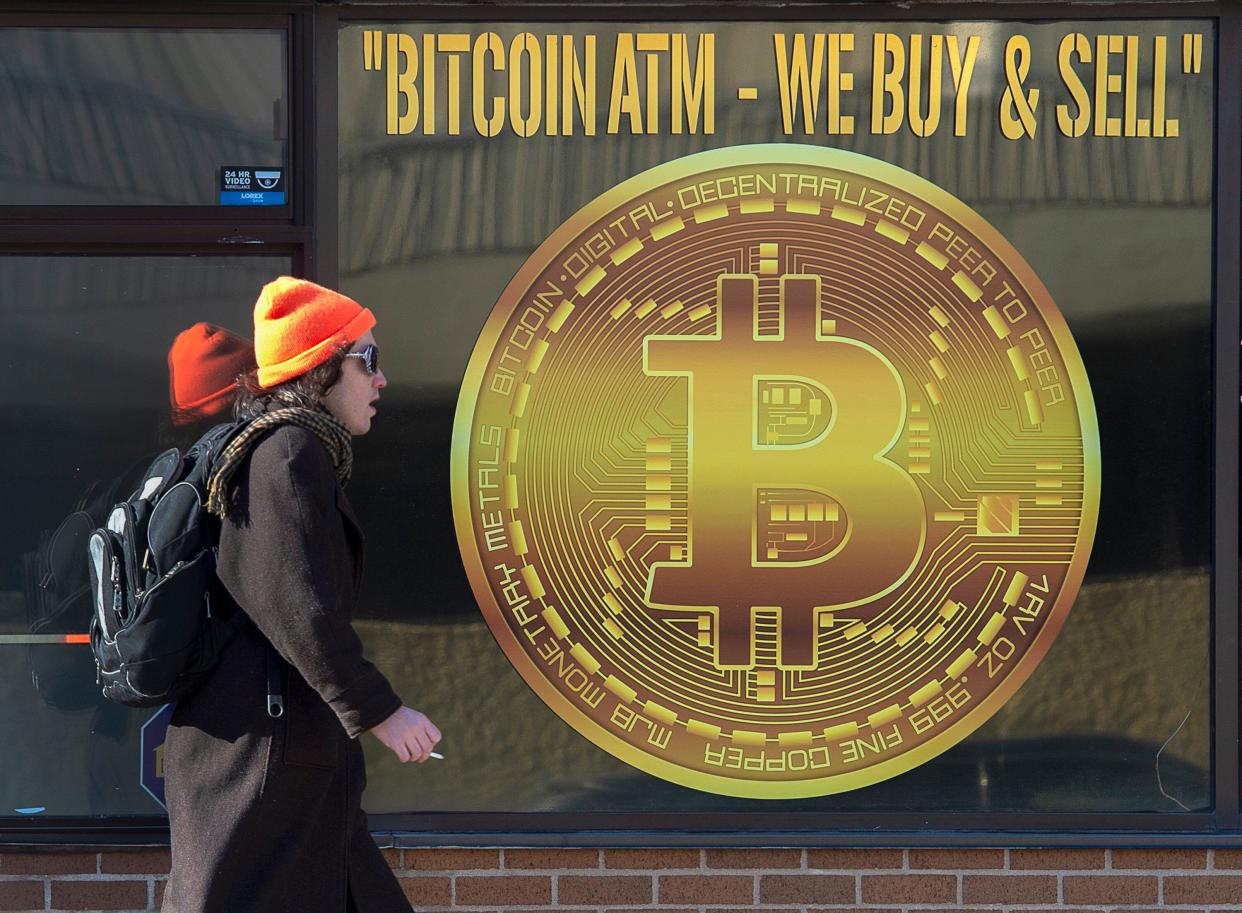 Halifax, Canada. 05th Feb, 2020. A sign advertises a Bitcoin automated teller machine, ATM, at a shop in Halifax on Wednesday, February 4, 2020. Coinbase is rolling out Interac e-transfer integration as part of its Canadian offerings as it says it's encouraged by the regulatory approach in the country. Credit: The Canadian Press/Alamy Live News