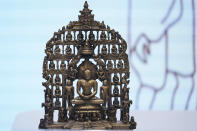 Some of the stolen objects being returned to India are displayed during a ceremony at the Indian consulate in New York, Thursday, Oct. 28, 2021. U.S. authorities have returned about 250 antiquities to India in a long-running investigation of a stolen art scheme. The items, worth an estimated $15 million, were handed over on Thursday during a ceremony at the Indian consulate in New York City. (AP Photo/Seth Wenig)