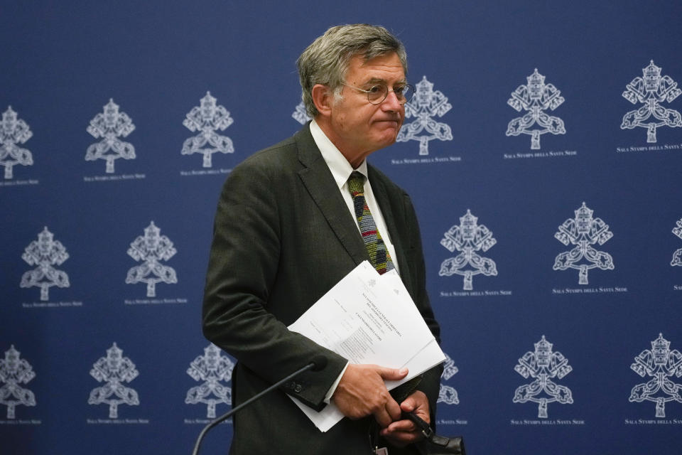 FILE - Paolo Ruffini, prefect of the Vatican's Dicastery of Communication arrives for a press conference on the upcoming Synod of Bishops, at the Vatican, Thursday, Sept. 21, 2023. Pope Francis is convening a global gathering of bishops and laypeople to discuss the future of the Catholic Church, including some hot-button issues that have previously been considered off the table for discussion. Key agenda items include women's role in the church, welcoming LGBTQ+ Catholics and how bishops exercise authority. For the first time, women and laypeople can vote on specific proposals alongside bishops.(AP Photo/Alessandra Tarantino, File)