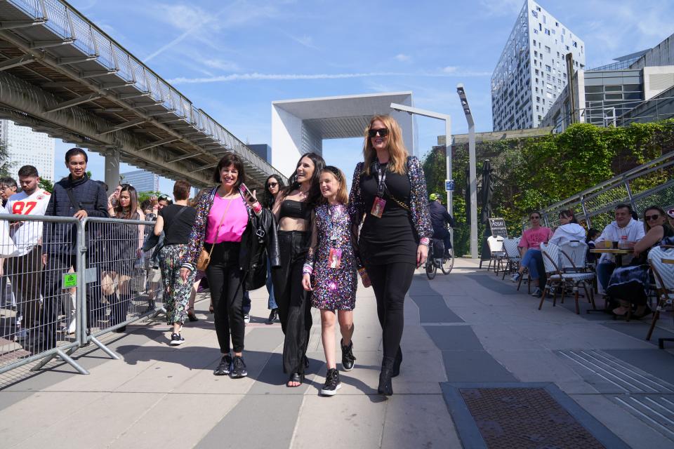 Stephanie Gottschalk (far right) walks with her daughter Brooklynn to see Taylor Swift's Eras Tour in Paris, France, on May 10, 2024.