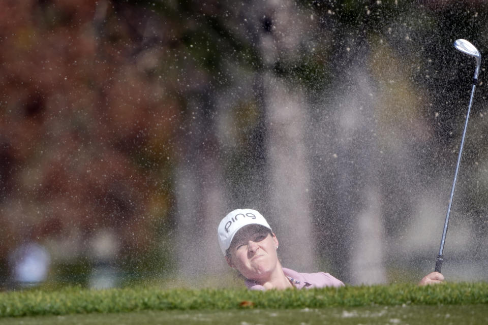 Ally Ewing hits a shot from the sand trap on the eighth hole during the first round of the LPGA Hilton Grand Vacations Tournament of Champions on Thursday, Jan. 19, 2023, in Orlando, Fla. (AP Photo/John Raoux)