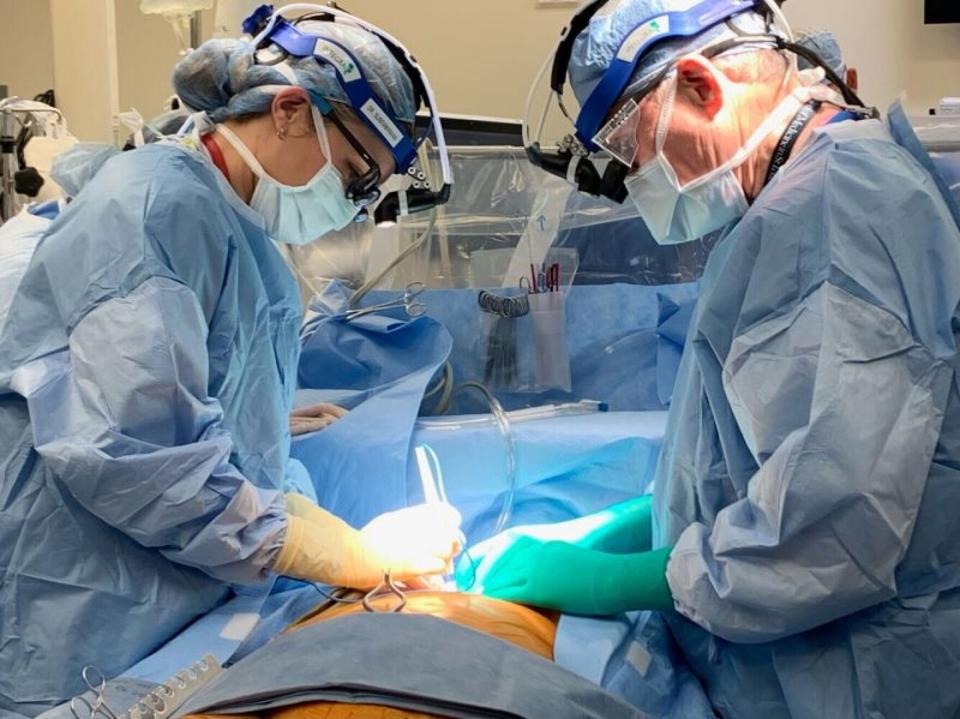 Dr. Harold Roberts and Dr. Sophia Roberts, father and daughter surgeons