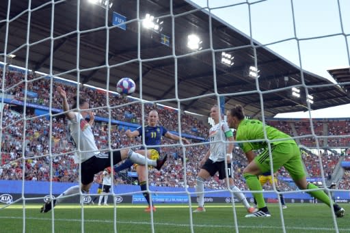 Sweden's winner arrived three minutes after half-time, with Stina Blackstenius (C) prodding home the rebound after Almuth Schult had saved a Fridolina Rolfo header