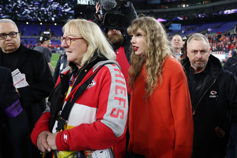 BALTIMORE, MARYLAND - JANUARY 28: Taylor Swift is seen on the field with Donna Kelce after the Kansas City Chiefs 17-10 victory against the Baltimore Ravens in the AFC Championship Game at M&T Bank Stadium on January 28, 2024 in Baltimore, Maryland. (Photo by Patrick Smith/Getty Images)