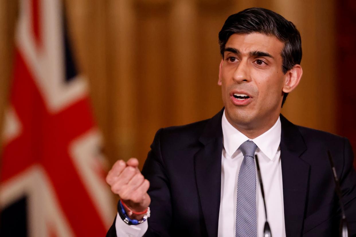 Britain's Chancellor of the Exchequer Rishi Sunak attends a virtual press conference inside 10 Downing Street in central London on March 3, 2021, following his earlier Budget. - Britain on Wednesday sharply cut the growth forecast of its coronavirus-ravaged economy, warning the pandemic was still causing 