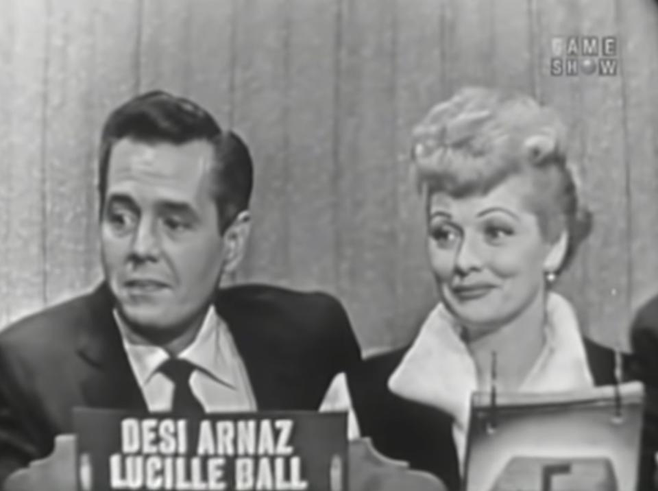 Desi Arnaz and Lucille Ball appear as guests on "What's My Line?" in October 1955