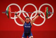 <p>Competing in the women's 55kg weightlifting category, Air Force servicewoman Hidilyn Diaz beat out world-record holder Liao Qiuyun to win the Philippines first ever Olympic gold medal.</p>