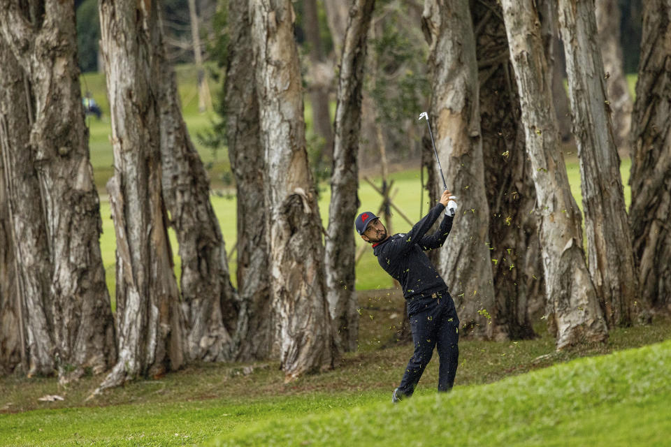 Abraham Ancer hits a shot on the sixth hole during the final round of LIV Golf Hong Kong at the Hong Kong Golf Club in Hong Kong Sunday, March 10, 2024. (Chris Trotman/LIV Golf via AP)